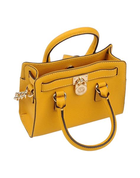 yellow michael kors bag with studs|macy's Michael Kors crossbody bags.